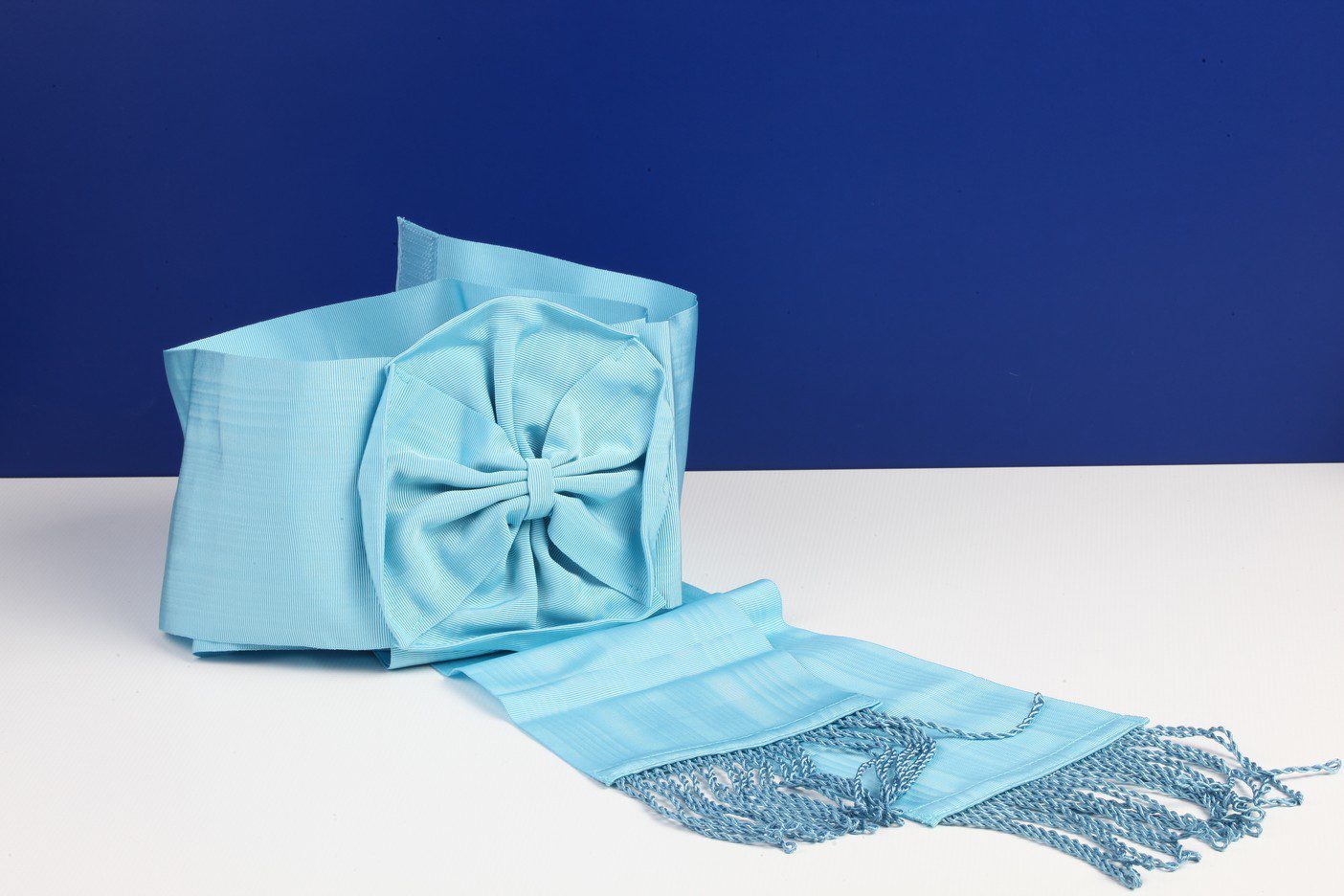 Ceinture moirée bleue franges bleues