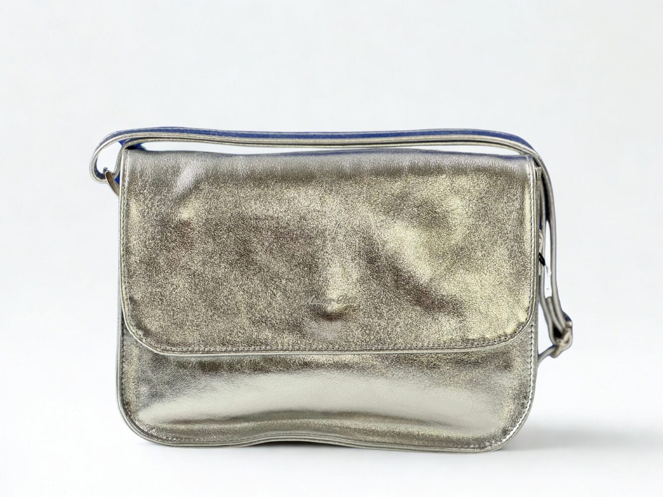 a silver bag on a white background